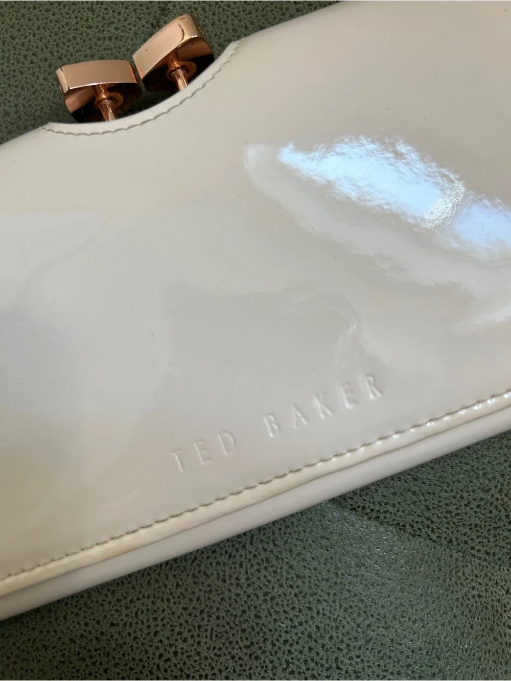 Ted Baker Glossy Patent Clutch in Light Cream